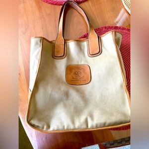 Ghurka Tan Leather Logo Patch on Cream Canvas